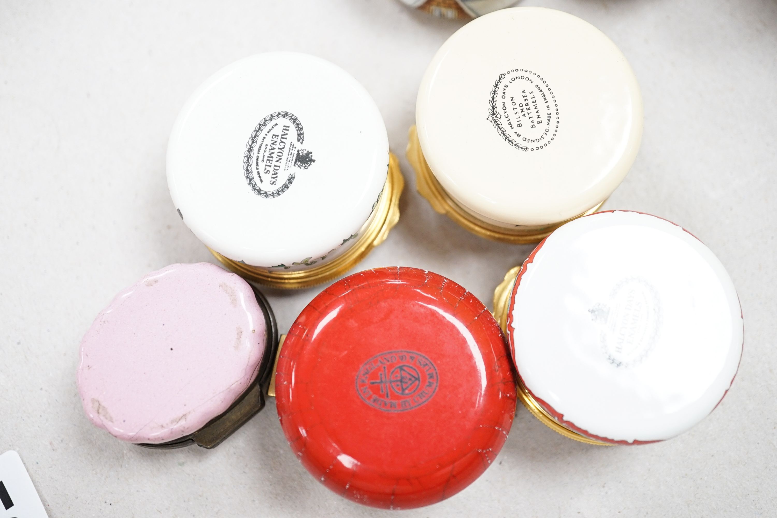 A collection of enamel patch boxes including Halcyon Days